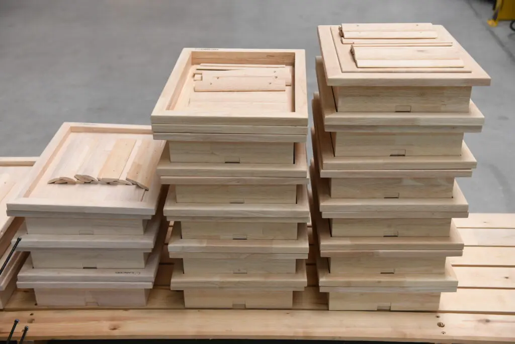 Natural and white oiled parts have been prepared to be assembled into a door - Tomsgates Production Belgium