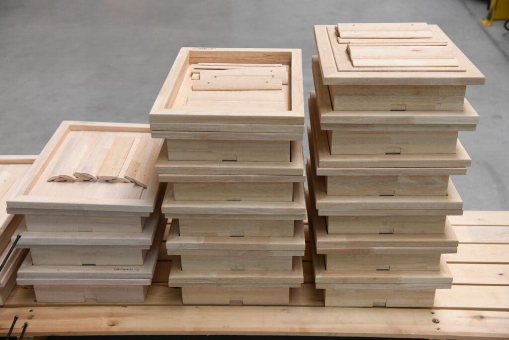 Natural and white oiled parts have been prepared to be assembled into a door - Tomsgates Production Belgium